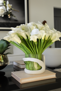 Fleurs dans vase photophore