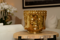 Bougie en forme de Bouddha doré