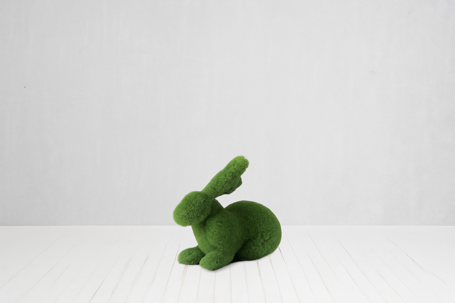 Lapin décoratif couché