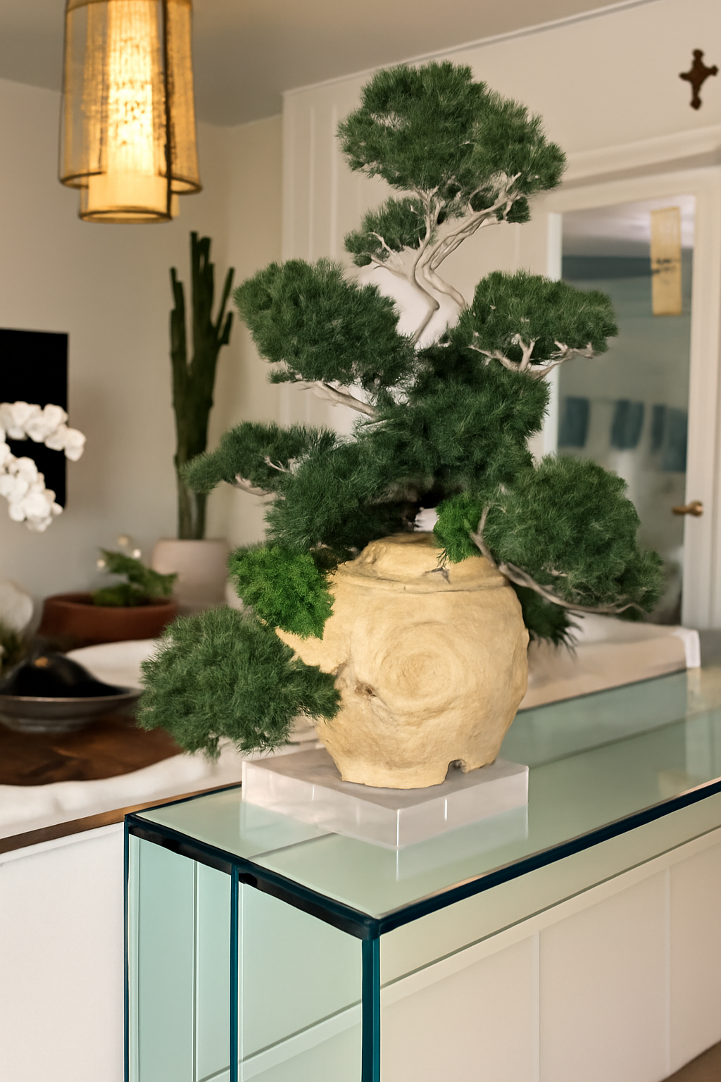 Vase en teck avec plante semi-cascade